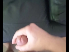 Strong cumshot on couch