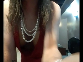 Jade in a red halter dress pleasing hurself to climax