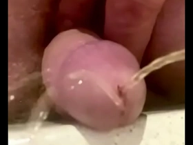 Extreme close up small dick piss