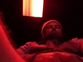 Jerking off in an adult theater