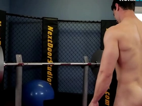Ripped gym stud masturbates on the bench press
